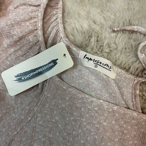 Light pink baby doll top from impressions boutique. Size small. Runs big.